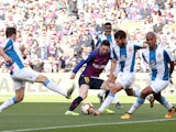 Lionel Messi is crowded out by players during the derby clash between Barcelona and Espanyol on March 30, 2019