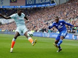 Cardiff City's Junior Hoilett in action with Chelsea's Antonio Rudiger during their Premier League clash on March 31, 2019