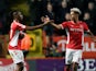 Charlton Athletic's Joe Aribo celebrates a goal with teammate Lyle Taylor in March 2019