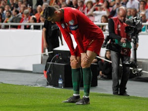 Cristiano Ronaldo stands injured for Portugal before leaving the field on March 25, 2019