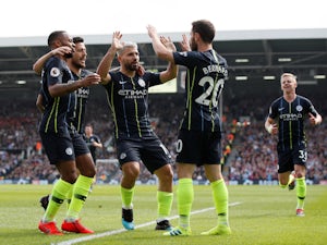 Manchester City players celebrate Bernardo Silva's goal against Fulham in the Premier League on March 30, 2019