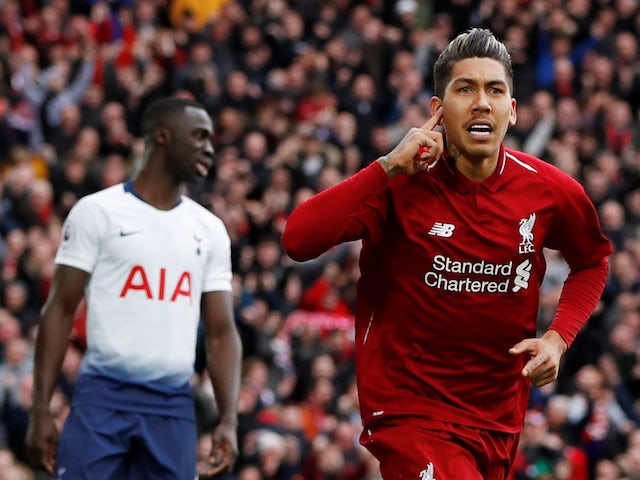 Liverpool's Roberto Firmino celebrates scoring against Tottenham Hotspur in the Premier League on March 31, 2019