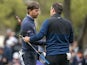 Kevin Kisner (left) shakes hands with Francesco Molinari on the 18th green during the semifinal round of the WGC - Dell Technologies Match Play golf tournament at Austin Country Club on March 31, 2019