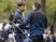 Kevin Kisner (left) shakes hands with Francesco Molinari on the 18th green during the semifinal round of the WGC - Dell Technologies Match Play golf tournament at Austin Country Club on March 31, 2019