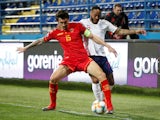 Montenegro's Stefan Savic and England's Raheem Sterling in action during their Euro 2020 qualifier on March 25, 2019
