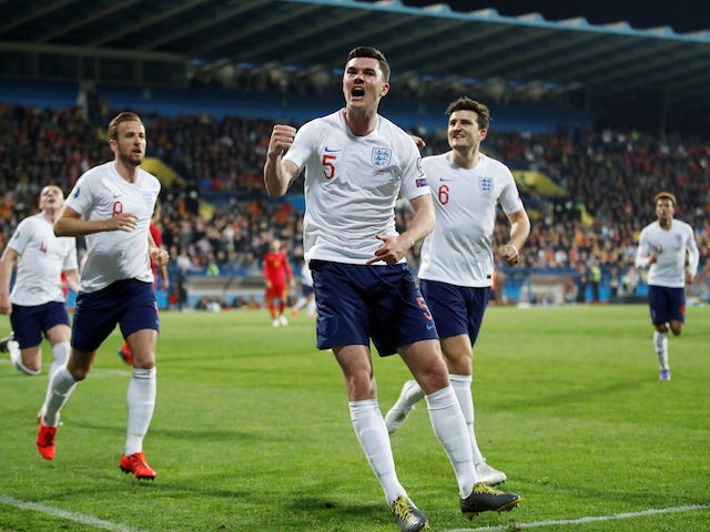 Michael Keane celebrates scoring England's leveller against Montenegro in their Euro 2020 qualifier on March 25, 2019