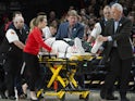 Portland Trail Blazers center Jusuf Nurkic (27) wheeled off the court after injuring his leg during a second overtime against the Brooklyn Nets at Moda Center on March 25, 2019