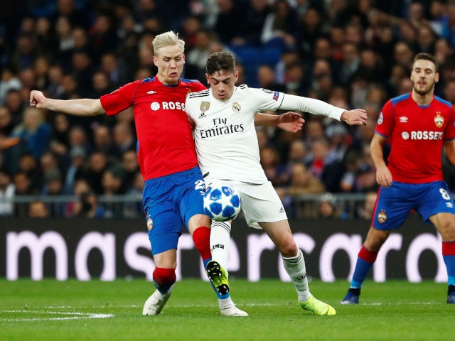 Real Madrid's Federico Valverde in action with CSKA Moscow's Hordur Magnusson during a Champions League clash in December 2018