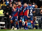 Huesca's players celebrate opening the scoring at the Bernabeu through Juan Camilo Hernandez's early strike on March 31, 2019