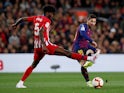 Barcelona's Lionel Messi in action with Atletico Madrid's Thomas Partey in La Liga on April 6, 2019
