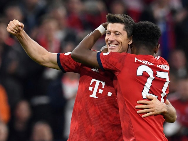 Five-star Bayern hammer Dortmund to move top