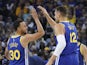 Golden State Warriors guard Stephen Curry (30) celebrates with center Andrew Bogut (12) against the Charlotte Hornets during the second quarter at Oracle Arena on April 1, 2019