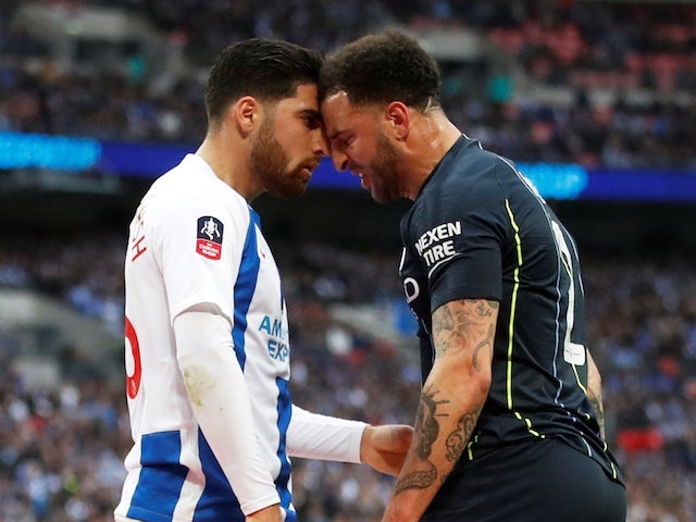 Manchester City's Kyle Walker goes head to head with Brighton's Alireza Jahanbakhsh on April 6, 2019