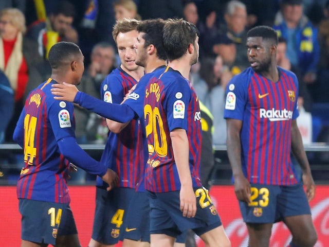 Barcelona players celebrate scoring against Villarreal on April 2, 2019