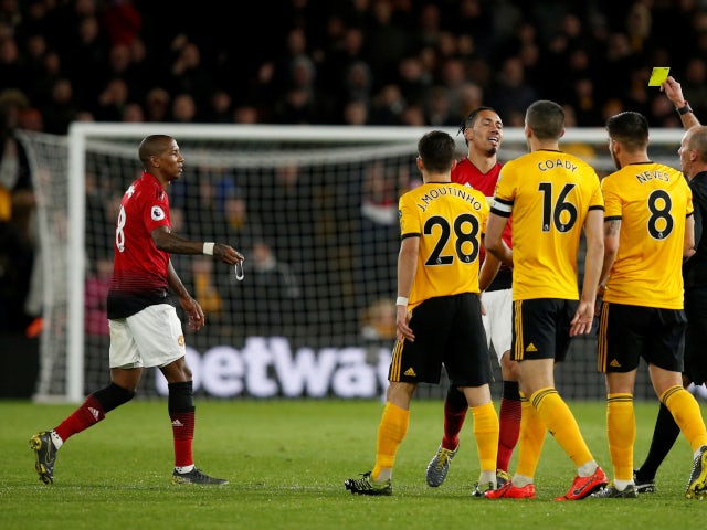 Manchester United's Ashley Young receives a second yellow card against Wolverhampton Wanderers in the Premier League on April 2, 2019.