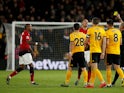 Manchester United's Ashley Young receives a second yellow card against Wolverhampton Wanderers in the Premier League on April 2, 2019.