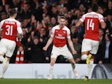Aaron Ramsey celebrates after opening the scoring for Arsenal in their Europa League meeting with Napoli on April 11, 2019