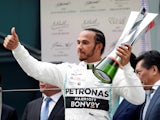 Lewis Hamilton celebrates winning the Chinese Grand Prix on April 14, 2019