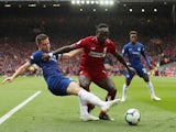 Chelsea's Cesar Azpilicueta challenges Liverpool's Sadio Mane in the Premier League at Anfield on April 14, 2019