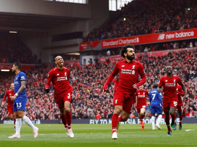 Liverpool's Mohamed Salah celebrates scoring against Chelsea in the Premier League at Anfield on April 14, 2019