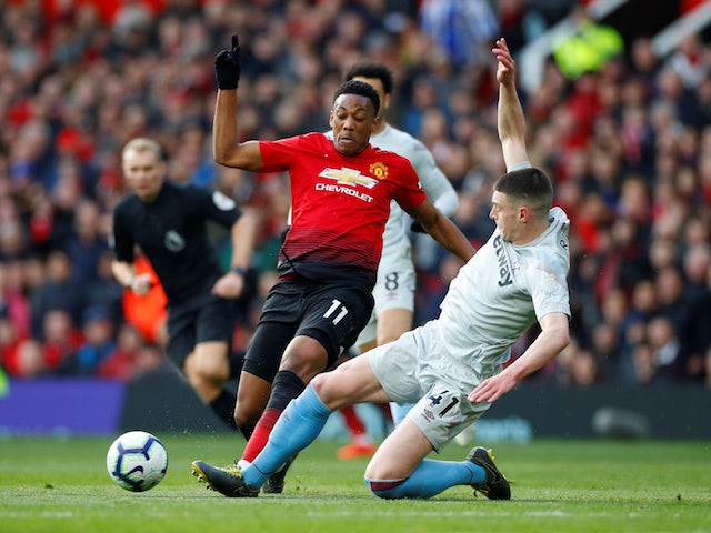Manchester United's Anthony Martial in action with West Ham United's Declan Rice in the Premier League on April 13, 2019