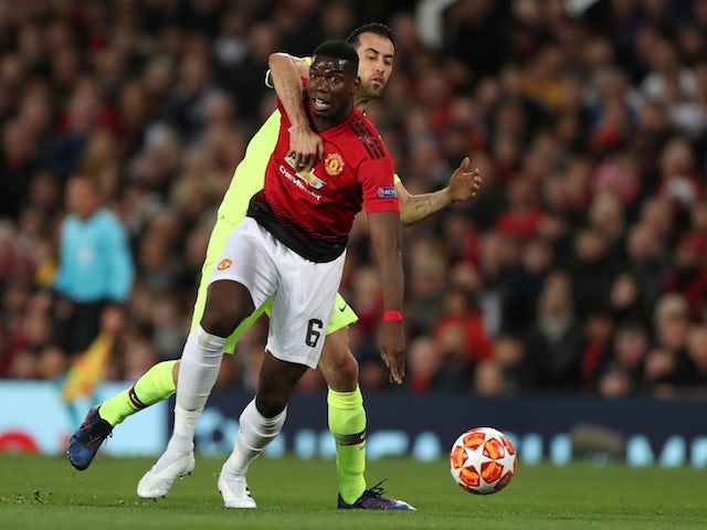 Barcelona's Sergio Busquets in action with Manchester United's Paul Pogba in the Champions League on April 10, 2019