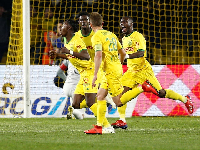 Anthony Limbombe celebrates with Nantes teammates after scoring on April 12, 2019