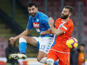 SPAL's Mirco Antenucci in action with Napoli's Raul Albiol in Serie A on December 22, 2018