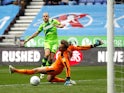 Norwich City's Teemu Pukki scores their first goal against Wigan on April 14, 2019