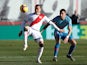 Rayo Vallecano's Raul de Tomas in action with Atletico Madrid's Jose Gimenez in February 2019