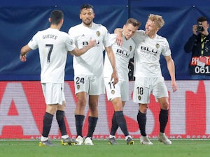 Valencia's Daniel Wass celebrates scoring their second goal against Villarreal with teammates on April 11, 2019