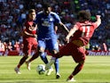Bruno Ecuele Manga and Mohamed Salah in action during the Premier League game between Cardiff City and Liverpool on April 21, 2019