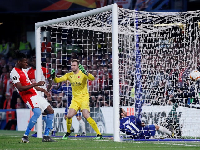 Slavia Prague's Simon Deli scores an own goal against Chelsea in the Europa League on April 18, 2019.