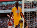 Christian Benteke celebrates opening the scoring during the Premier League game between Arsenal and Crystal Palace on April 21, 2019