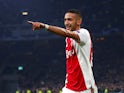 Ajax's Hakim Ziyech celebrates scoring his side's first goal against Real Madrid in February 2019