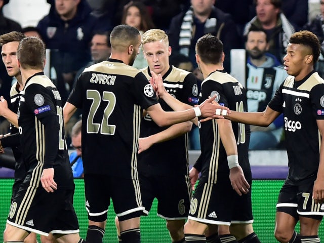 Ajax's Donny van de Beek celebrates with his teammates after equalising against Juventus on April 16, 2019