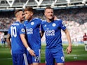 Leicester City's Jamie Vardy celebrates scoring their first goal against West Ham with James Maddison and Harvey Barnes on April 20, 2019