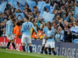 Manchester City players celebrate Raheem Sterling's goal against Tottenham Hotspur in the Champions League on April 27, 2019