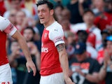Mesut Ozil celebrates his equaliser during the Premier League game between Arsenal and Crystal Palace on April 21, 2019