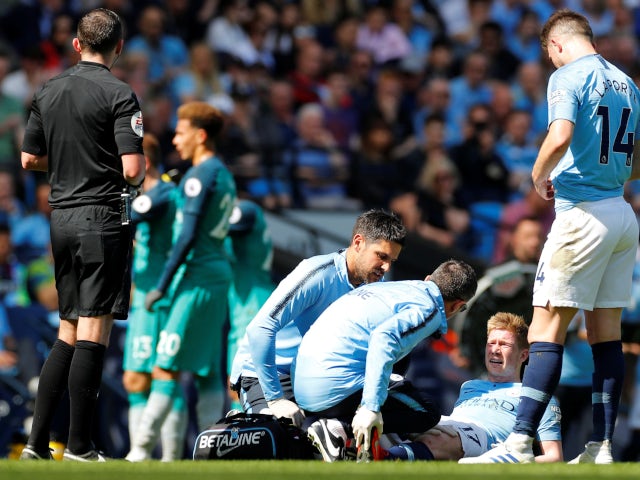 Manchester City's Kevin De Bruyne receives treatment after suffering an injury against Tottenham Hotspur in the Premier League on April 20, 2019.