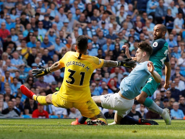 Tottenham Hotspur's Lucas Moura is denied by Manchester City's defence in the Premier League on April 20, 2019.
