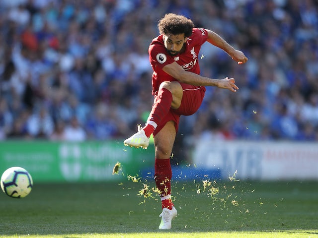 Mohamed Salah takes a shot during the Premier League game between Cardiff City and Liverpool on April 21, 2019
