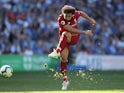 Mohamed Salah takes a shot during the Premier League game between Cardiff City and Liverpool on April 21, 2019