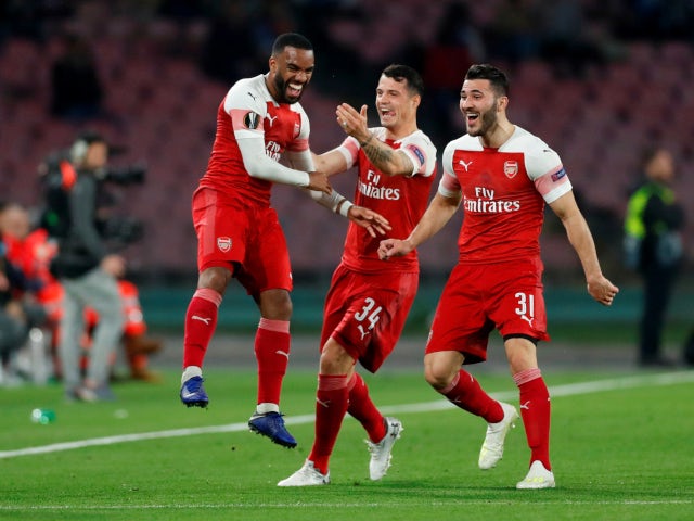 Alexandre Lacazette celebrates after opening the scoring for Arsenal away to Napoli on April 18, 2019