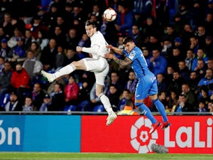 Real Madrid's Gareth Bale challenges Getafe's Mauro Arambarri for the ball in La Liga on April 25, 2019