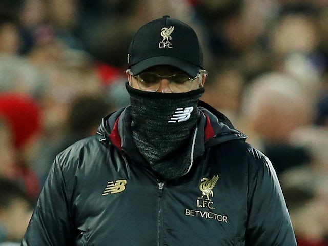 Klopp expects tough final two games in hunt for title