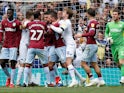 Leeds and Aston Villa players scrap during their Championship clash on April 28, 2019