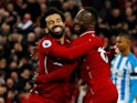 Naby Keita celebrates scoring with Mohamed Salah during the Premier League game between Liverpool and Huddersfield Town on April 26, 2019