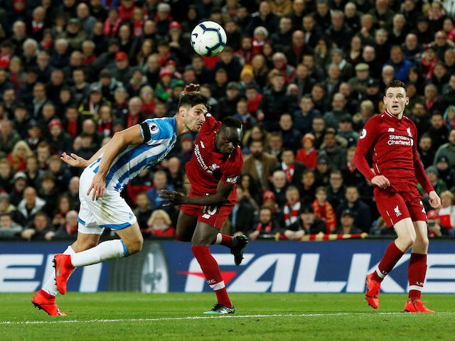 Sadio Mane scores the fourth during the Premier League game between Liverpool and Huddersfield Town on April 26, 2019