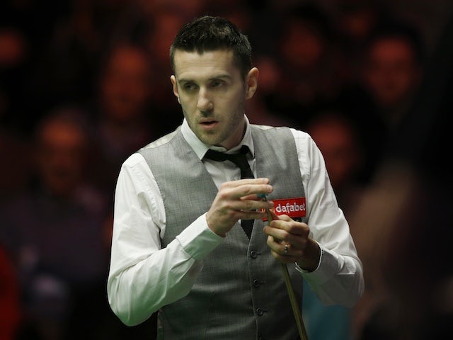 Mark Selby and John Higgins advance to second round at Milton Keynes